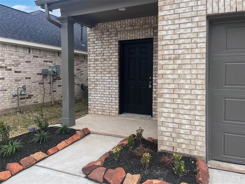 The Sparrow II- Front Porch. Home under construction. Sample floor plan photo used for illustrative purposes only. Upgrades, selections options, windows and colors may vary.