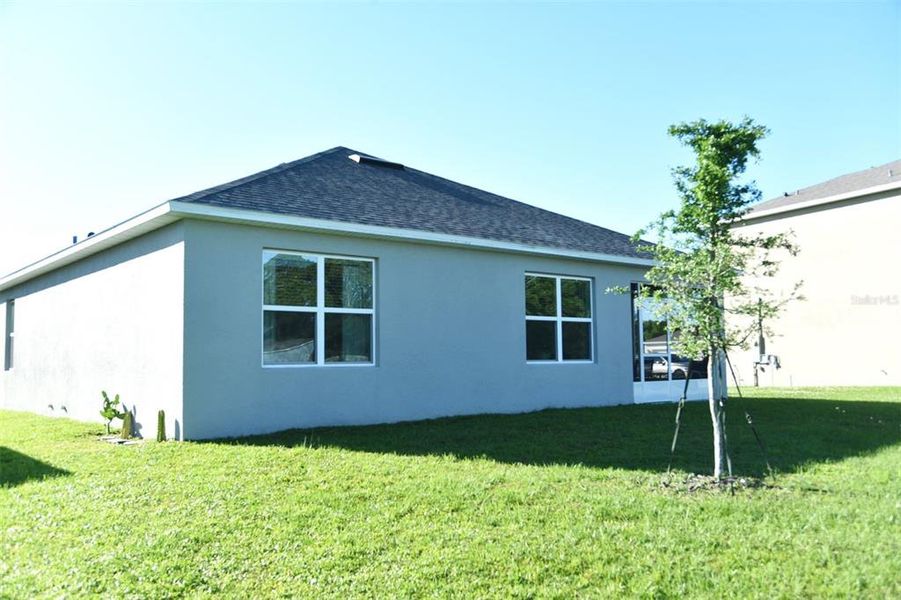 Front exterior of a new home in Greenbrier, Tavares, FL, highlighting curb appeal (Image 19).
