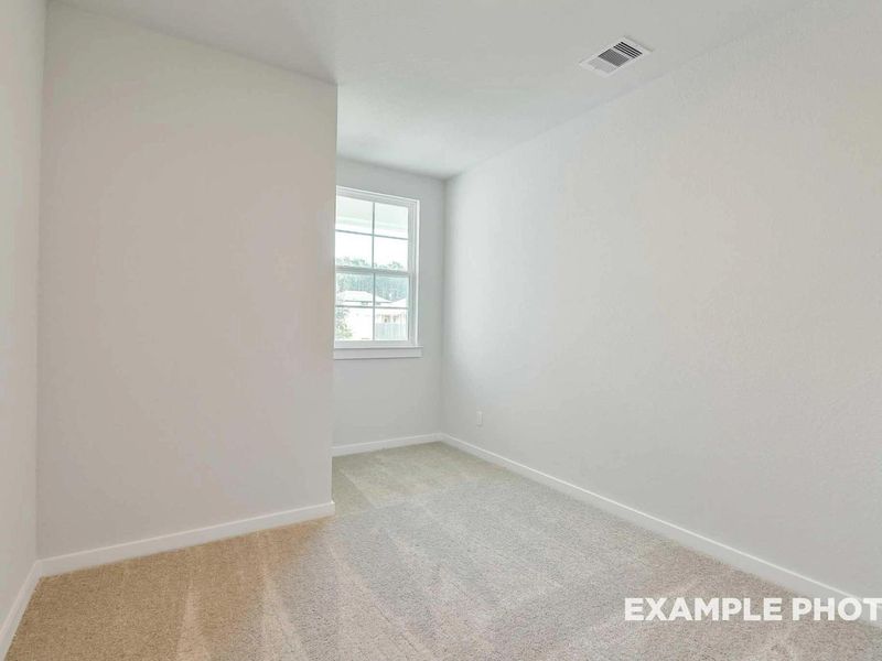 Spacious, unfurnished interior of a new home in Caney Creek Place, Conroe (Image 22).