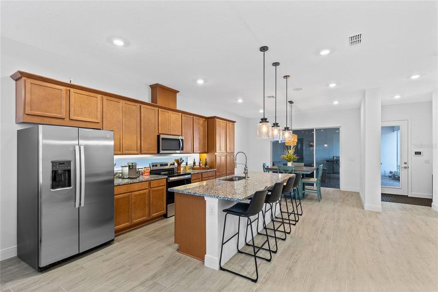 Furnished interior view inside a new home in Laureate Park, Orlando (Image 8).