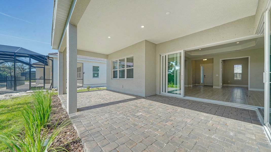 Exterior details and patio area of a home in Grand Palm, Venice (Image 26).