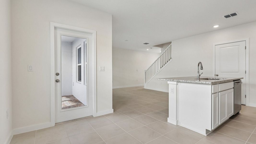 Furnished interior view inside a new home in Cyrene at Harmony, St. Cloud (Image 11).