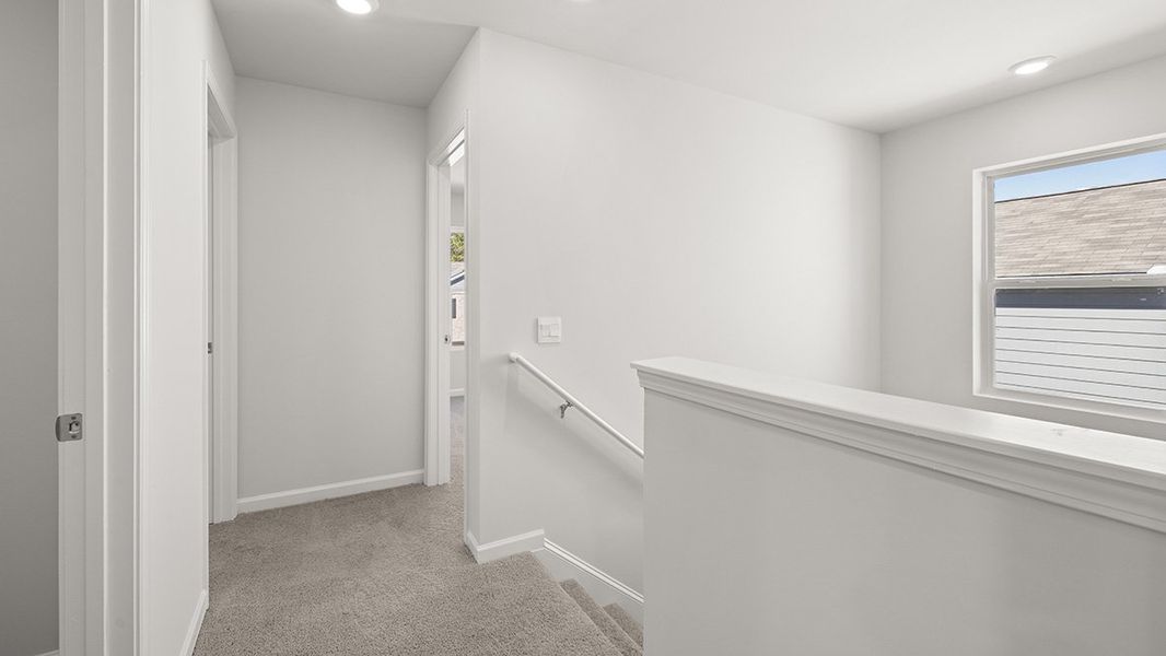 Representative unfurnished interior of a home built from the Belhaven by D.R. Horton in Oaks at Cedar Grove, Fairburn (Image 24).