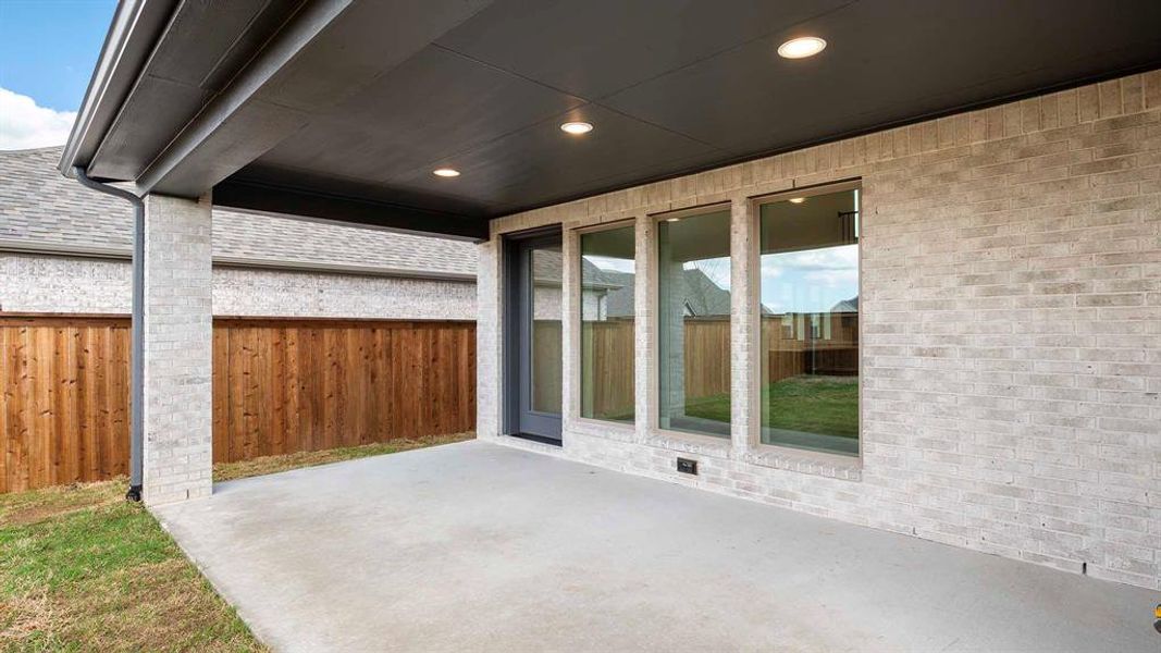 Exterior details and patio area of a home in Cambridge Crossing, Celina (Image 2).