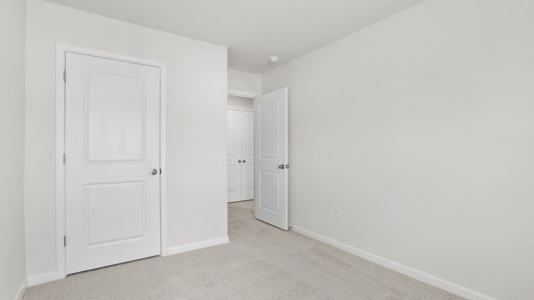 Spacious, unfurnished interior of a new home in Chestnut Ridge Townhomes, Greenville (Image 19).