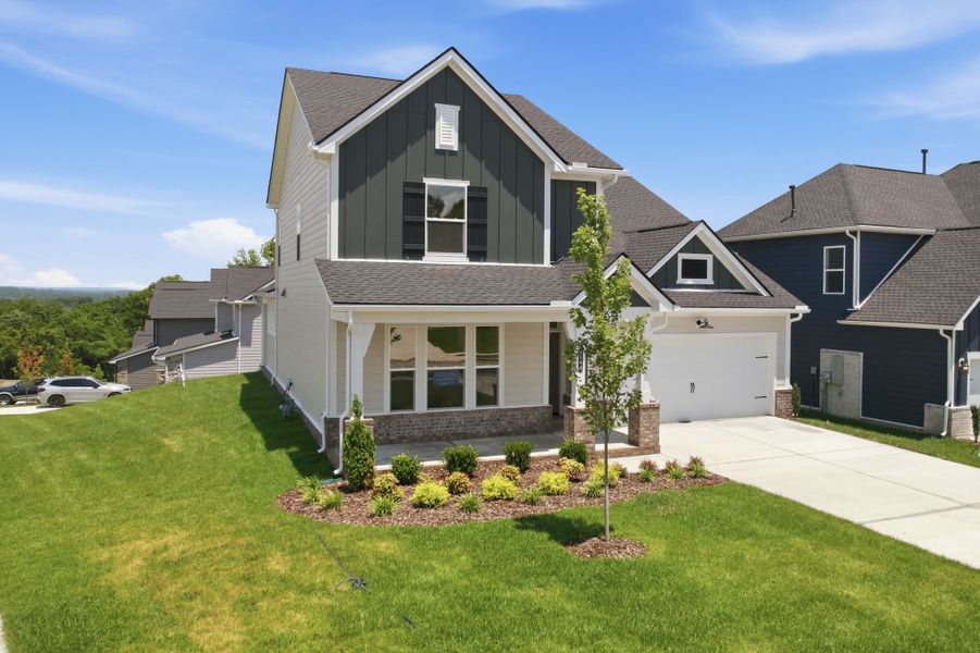 Front exterior of a new home in The Preserve at Five Oaks, Lebanon, TN, highlighting curb appeal (Image 2).