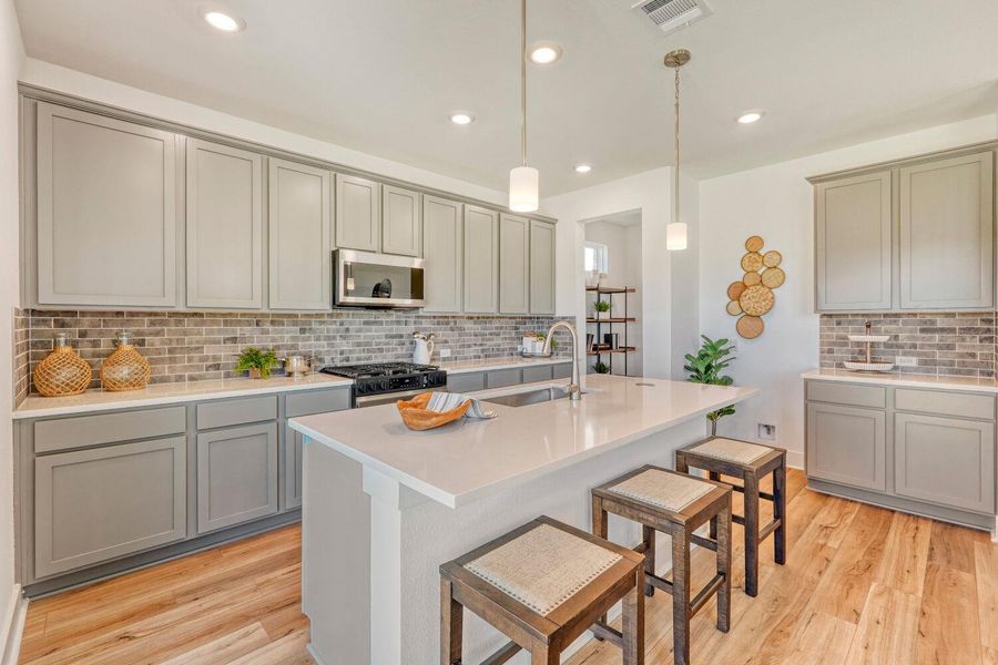 Furnished interior view inside a new home in Freedom at Anthem, Kyle (Image 8).