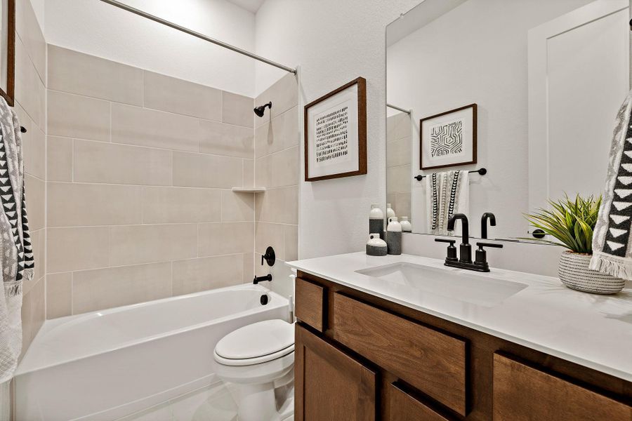 Bathroom 2 is just outside bedroom 2 on the main level. Bathroom 2 is just outside bedroom 2 on the main level.