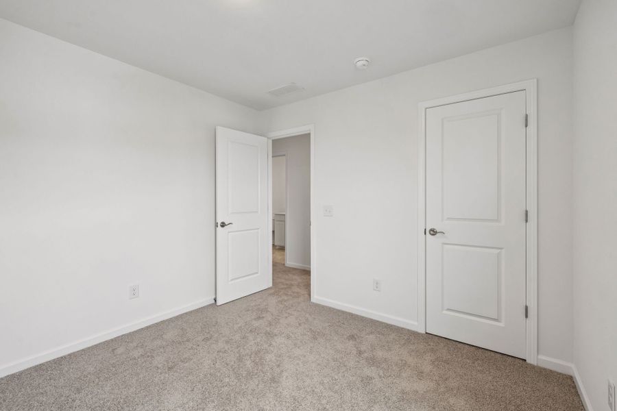 Spacious, unfurnished interior of a new home in Highlands of Carter's Station, Columbia (Image 31).