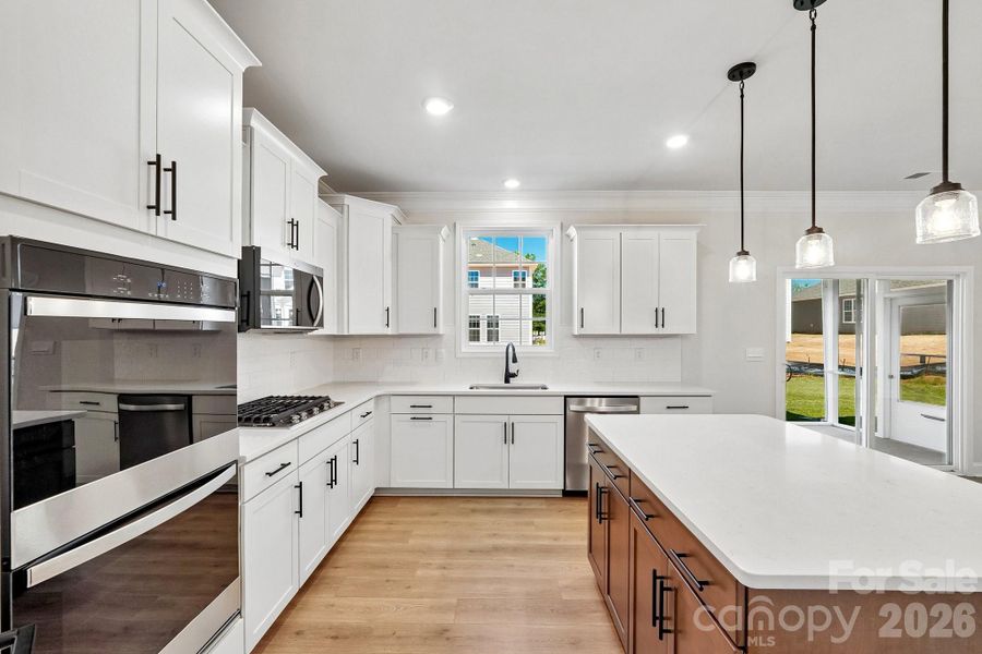Furnished interior view inside a new home in Sylvan Creek, Denver (Image 7).