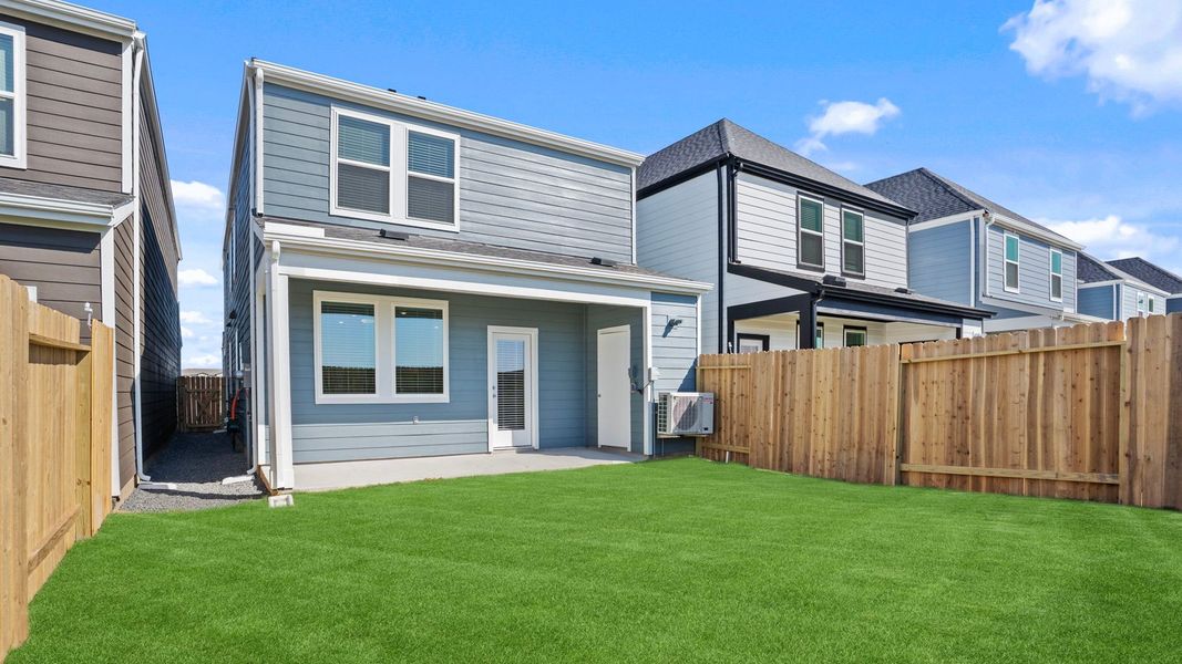 Exterior details and patio area of a home in Villarosa at Tamarron, Katy (Image 26).