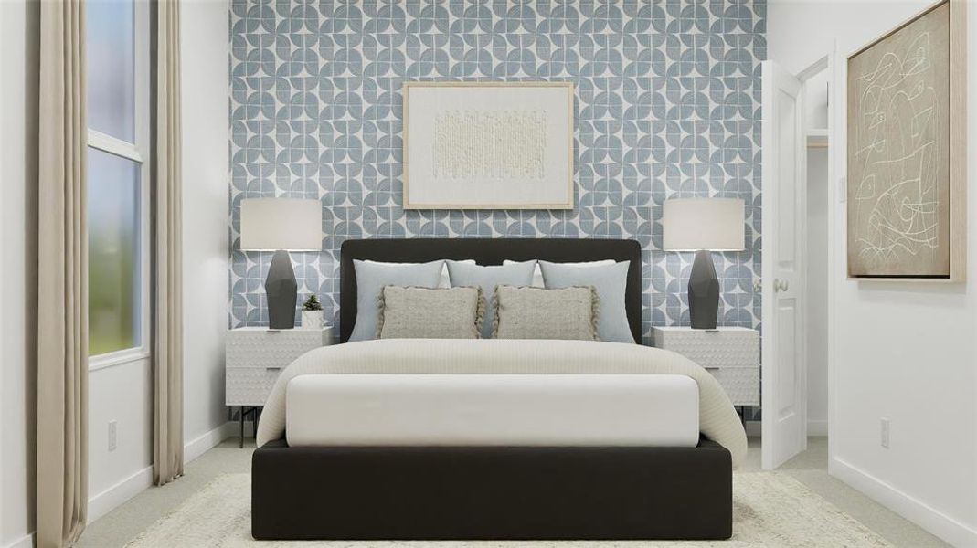 Bedroom featuring baseboards and carpet Bedroom featuring baseboards and carpet