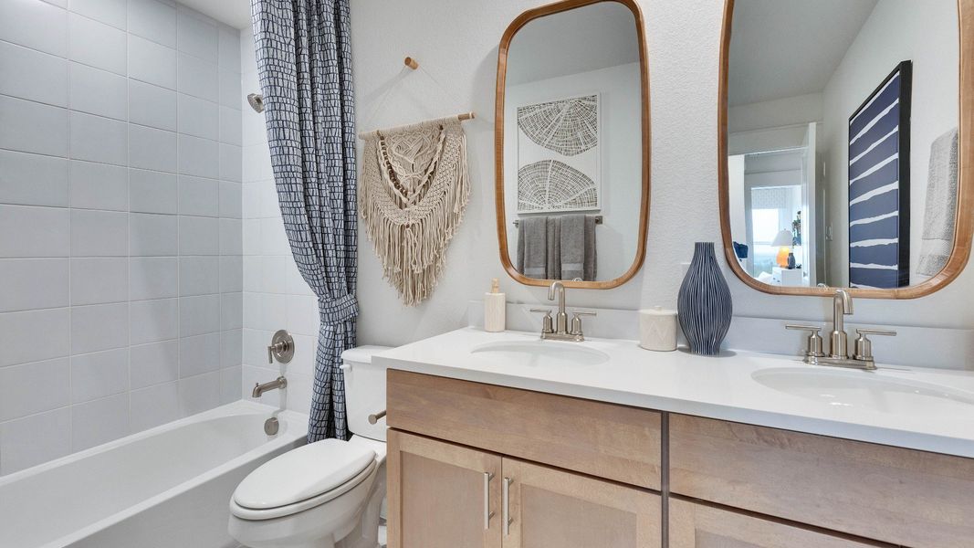 Representative furnished interior of a home built from the Meyerson by DRB Homes in Infinity Square, Kyle (Image 49).