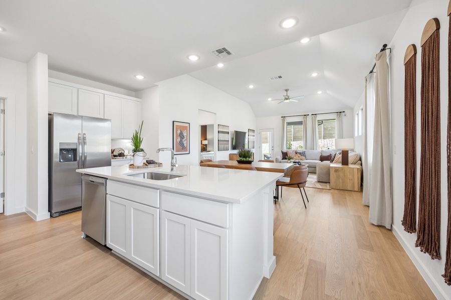 Kitchen in the Magnolia home plan by Trophy Signature Homes – REPRESENTATIVE PHOTO Kitchen in the Magnolia home plan by Trophy Signature Homes – REPRESENTATIVE PHOTO