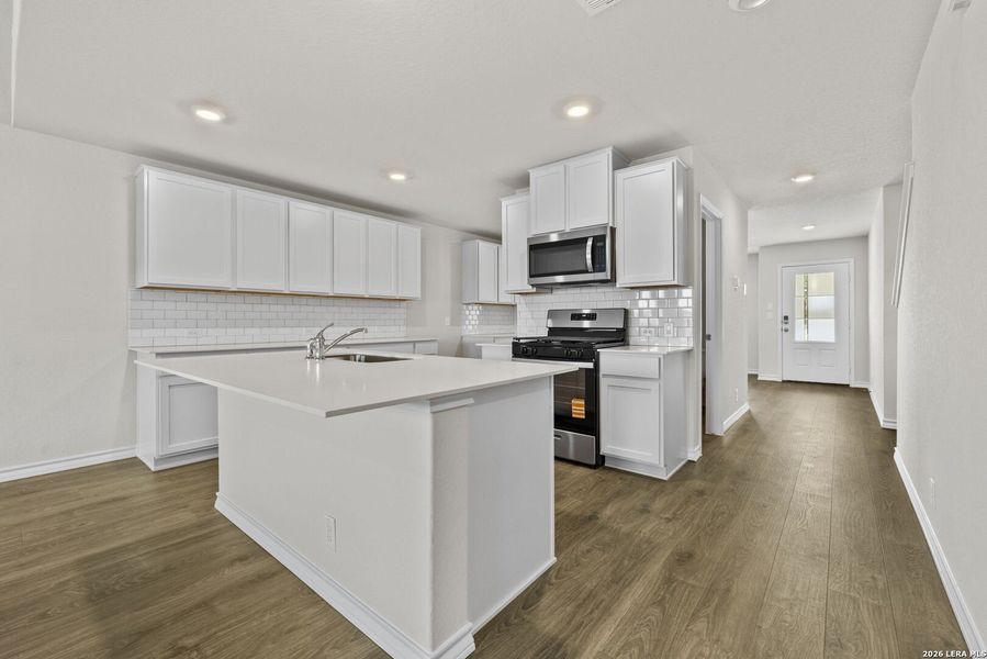 Furnished interior view inside a new home in Redbird Ranch, San Antonio (Image 6).