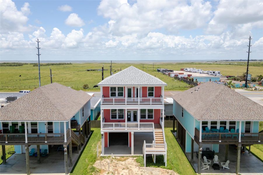 Front exterior of a new home in , Galveston, TX, highlighting curb appeal (Image 1). Front exterior of a new home in , Galveston, TX, highlighting curb appeal (Image 1).