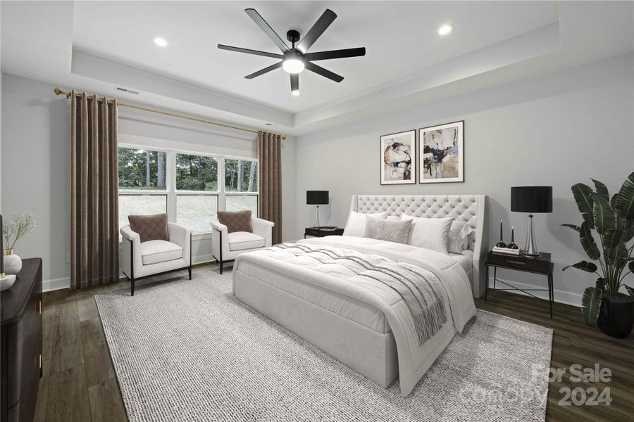 Large main Bedroom with lots windows & tray ceiling.