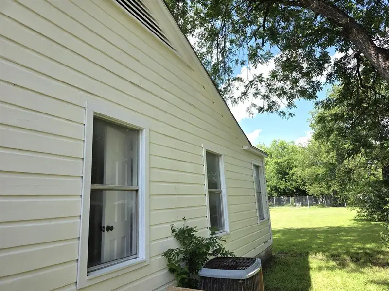 Exterior details and patio area of a home in , Brownwood (Image 3).