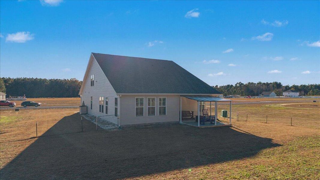 Exterior details and patio area of a home in , Harleyville (Image 37).