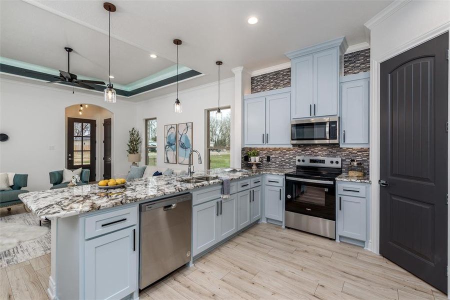 Spacious kitchen with custom designer paint. Spacious kitchen with custom designer paint.
