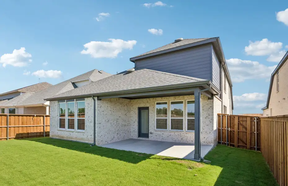 Exterior details and patio area of a home in Highland Lakes, McKinney (Image 2).