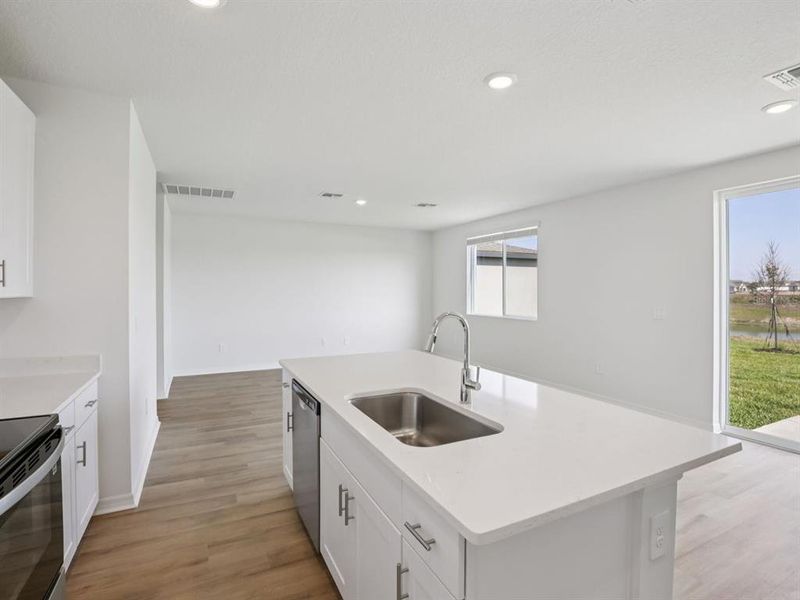 Furnished interior view inside a new home in Oakfield Trails - Premier Series, Parrish (Image 6).