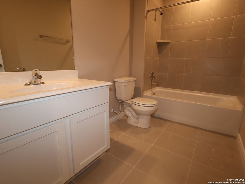 Furnished interior view inside a new home in Greenspoint Heights, Seguin (Image 6).