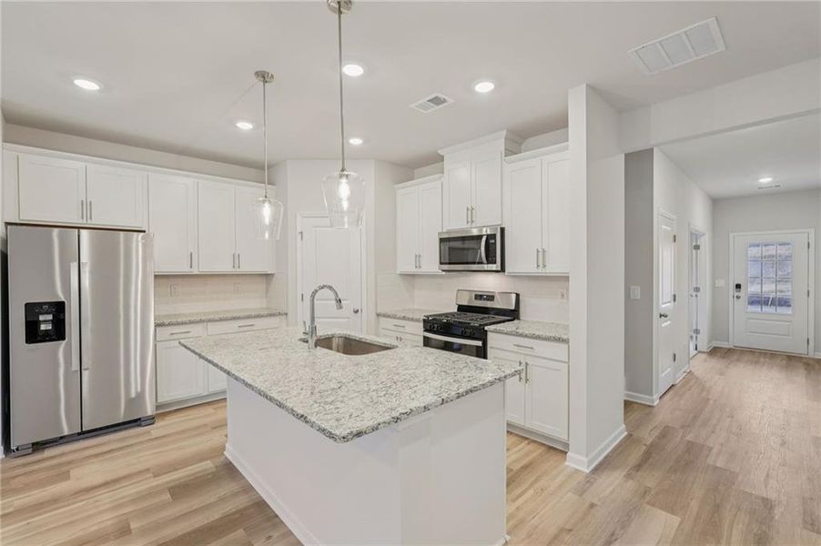 Furnished interior view inside a new home in Harmony Manor, Fairburn (Image 11).