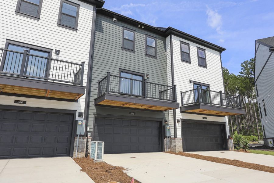 Front exterior of a new home in Nexton, Summerville, SC, highlighting curb appeal (Image 26).