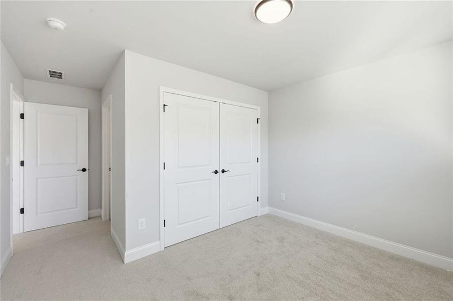 Spacious, unfurnished interior of a new home in Berkeley Mill, Cumming (Image 41).