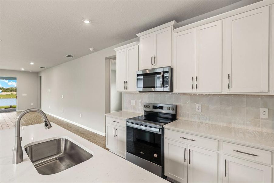 Furnished interior view inside a new home in Sunstone at Wellen Park, Venice (Image 12).
