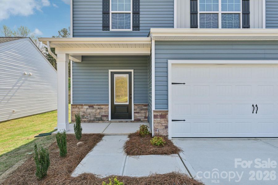 Exterior details and patio area of a home in Willow Estates, Shelby (Image 3).