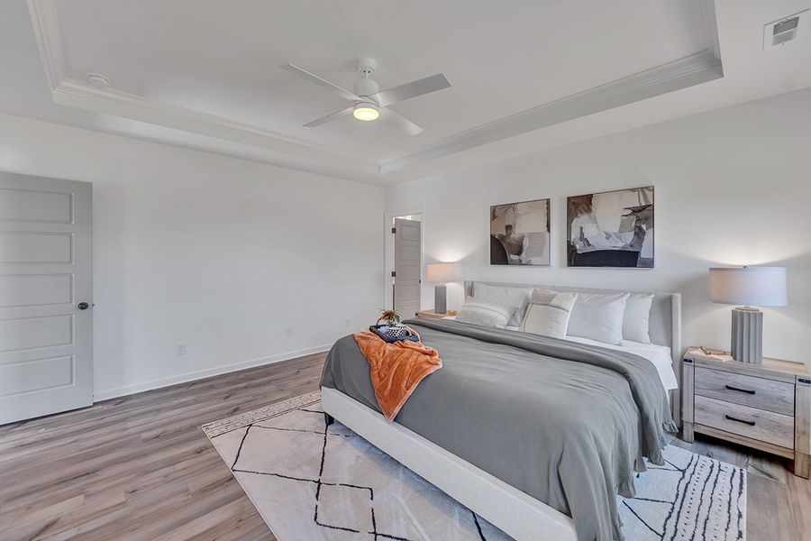 Representative furnished interior of a home built from the Blossom by Great Southern Homes in Oak Hollow, Longs (Image 28).