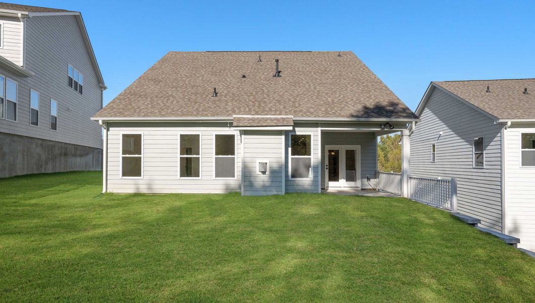 Front exterior of a new home in Whitehawk Meadows, Travelers Rest, SC, highlighting curb appeal (Image 2).