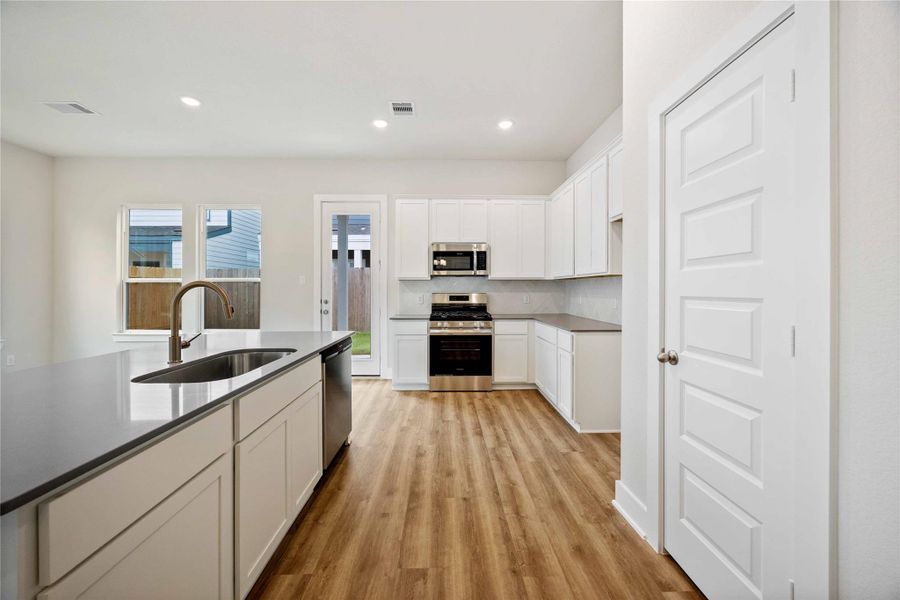 Furnished interior view inside a new home in Alicante, Houston (Image 6).