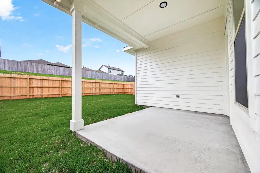 Exterior details and patio area of a home in Mostyn Springs, Magnolia (Image 4).