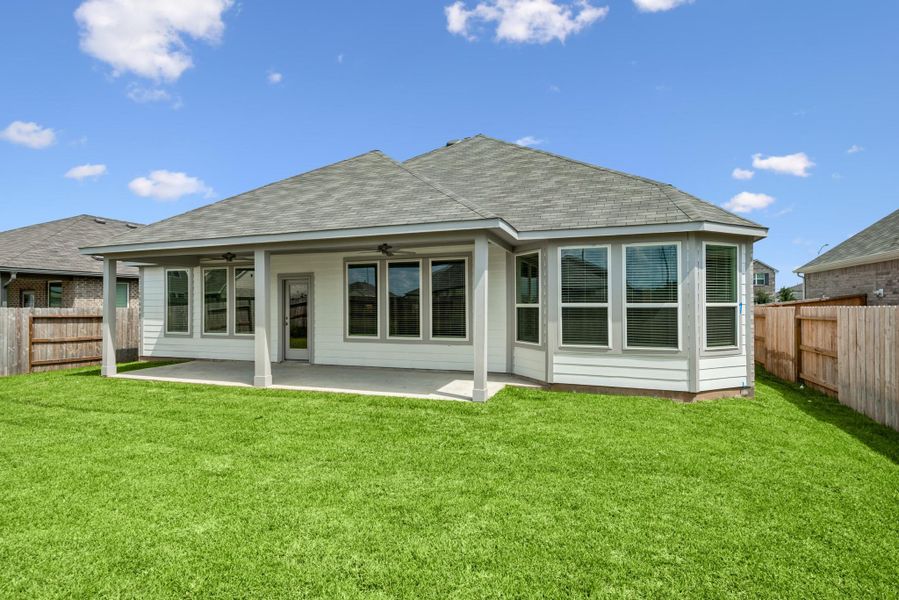 Exterior details and patio area of a home in Miller's Pond, Rosenberg (Image 3). Exterior details and patio area of a home in Miller's Pond, Rosenberg (Image 3).