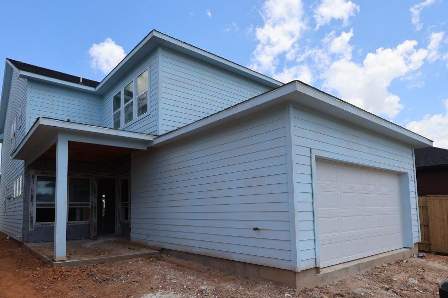 In-progress construction of a new home in Elyson - Grove Row Collection, Katy, TX (Image 9).