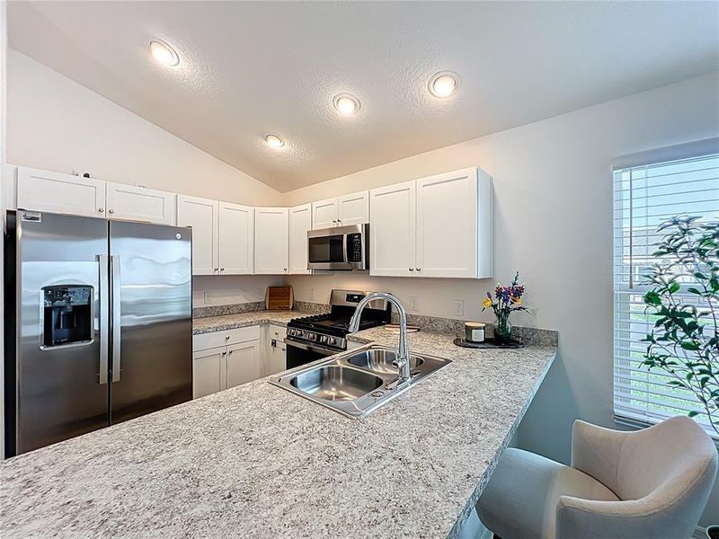 Furnished interior view inside a new home in , The Villages (Image 16).