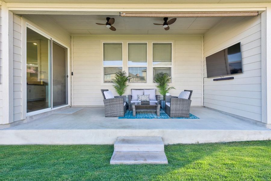 Exterior details and patio area of a home in Big Sky Ranch - Executive Collection, Dripping Springs (Image 3).