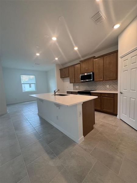 Furnished interior view inside a new home in Trinity Gardens, Deland (Image 7).