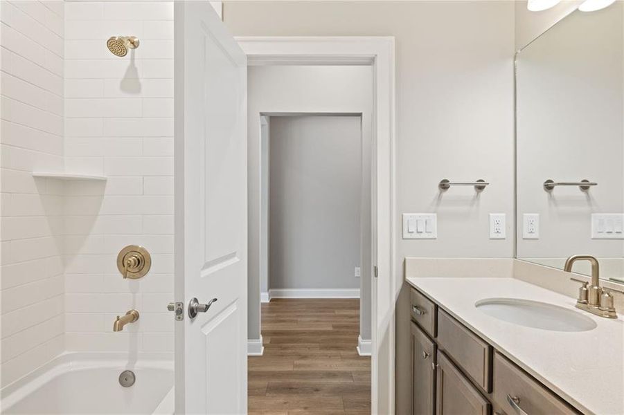 Furnished interior view inside a new home in The Courtyards at Bailey Farm, Dacula (Image 10).