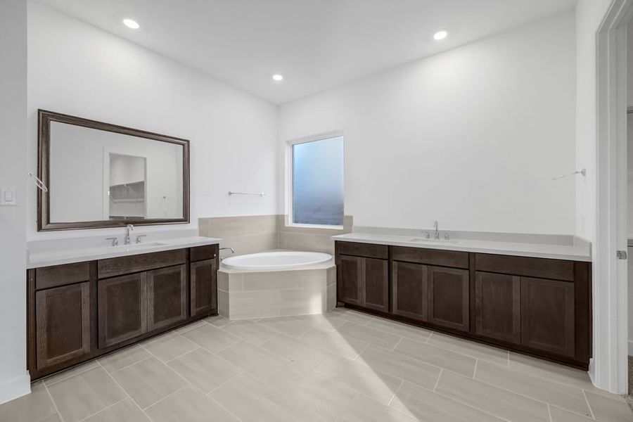 Furnished interior view inside a new home in Avalon at Friendswood 70s, Friendswood (Image 16).