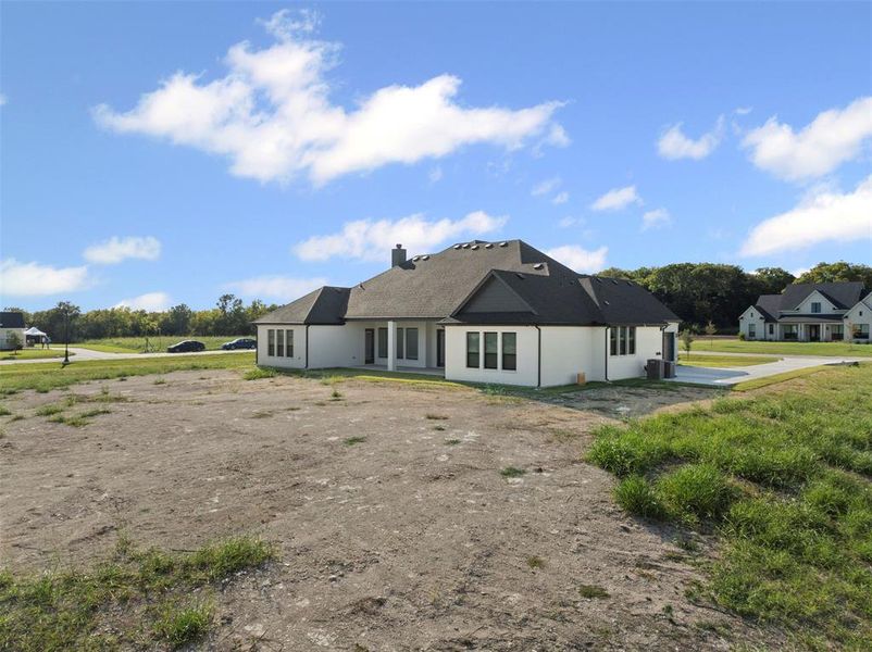 Exterior details and patio area of a home in Tuscan Estates (1 Acre Lots), Waxahachie (Image 19). Exterior details and patio area of a home in Tuscan Estates (1 Acre Lots), Waxahachie (Image 19).