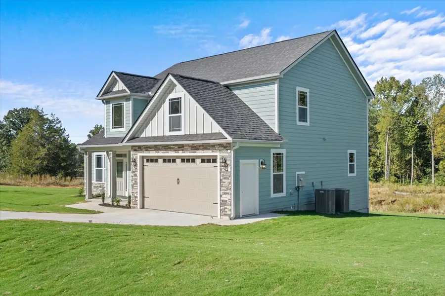 Representative exterior photo of a completed home built from the Enory by Enchanted Homes in Messer Farms, Inman, SC (Image 2). Representative exterior photo of a completed home built from the Enory by Enchanted Homes in Messer Farms, Inman, SC (Image 2).