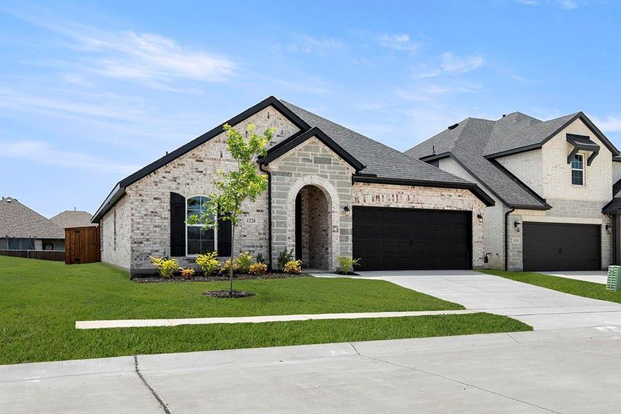 Front exterior of a new home in Walden Pond, Forney, TX, highlighting curb appeal (Image 24).