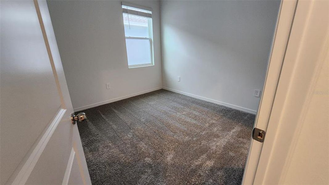 Spacious, unfurnished interior of a new home in Knightsbridge, Kissimmee (Image 9).