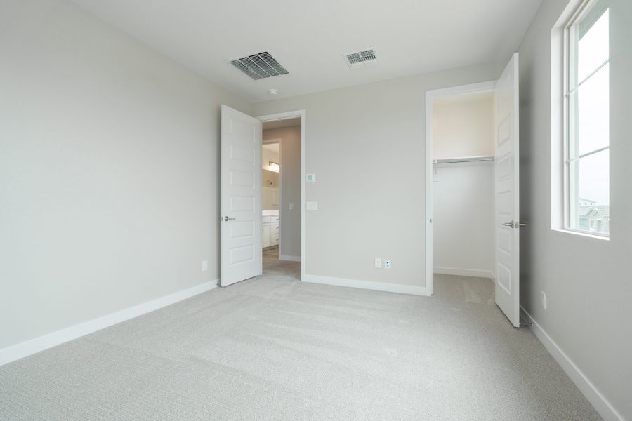 Spacious, unfurnished interior of a new home in Waterston Central, Gilbert (Image 17).