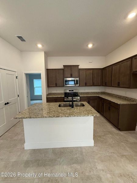 Furnished interior view inside a new home in Winding Oaks, Weeki Wachee (Image 3).
