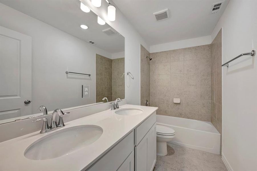 Furnished interior view inside a new home in Lilyana, Celina (Image 5).